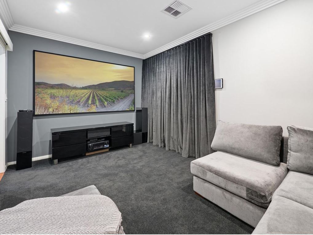 Home theatre with grey decor
