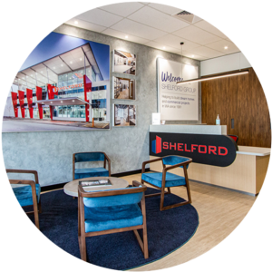 Shelford Group's Southwest office reception area is furnished with chairs and a table.